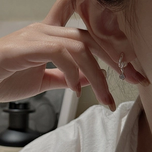 Minimalist S925 sterling silver twisted hoop earrings with sparkling zircon pendant