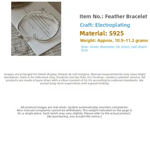 Macro view of S925 sterling silver feather cuff bracelet with lobster clasp extension