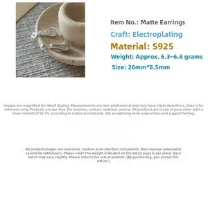 Detailed view of matte S925 silver teardrop earrings measuring 26mm by 8.5mm