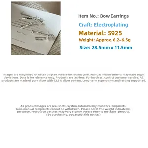 Detailed specs of S925 sterling silver bow earrings measuring 28.5mm by 11.5mm