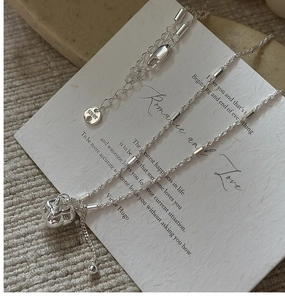 Macro shot of S925 sterling silver necklace detail showing the AG925 hallmark stamp