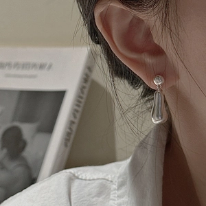 Minimalist S925 sterling silver drop earrings with irregular water droplet design for women