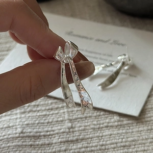 Elegant S925 sterling silver bow knot stud earrings with polished mirror finish for women