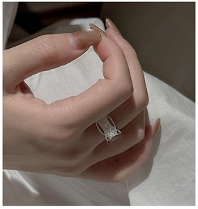 Detailed view of vintage S925 sterling silver star ring with intricate embossed texture