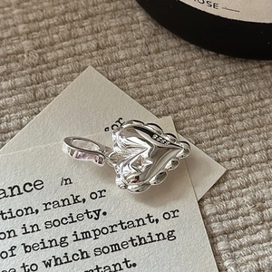 S925 sterling silver heart pendant with star-set zircon and wavy edge texture