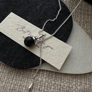 Elegant S925 sterling silver necklace with black sphere and gourd pendant for women