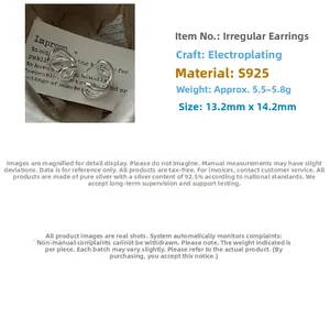 Macro view of S925 sterling silver hoop earrings with irregular geometric twist texture