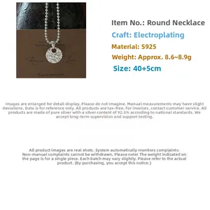 Macro detail of S925 sterling silver necklace with textured round disc pendant and bead chain