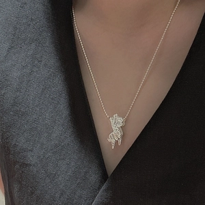 Minimalist S925 sterling silver necklace with vintage rocking horse pendant on model