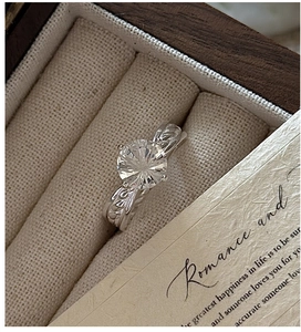 Detailed view of S925 sterling silver ring with large round white crystal in gift box