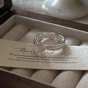 S925 sterling silver ring with white crystal and braided band on vintage box