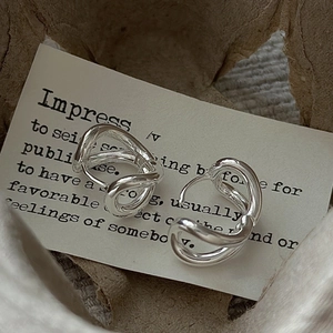 Minimalist S925 sterling silver chunky twisted hoop earrings on vintage card display