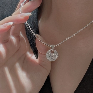 S925 sterling silver necklace featuring a CNC textured disk pendant on a bead chain