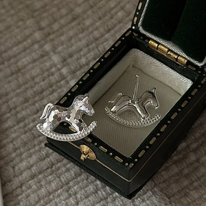 S925 sterling silver rocking horse earrings with cubic zirconia in a vintage jewelry box