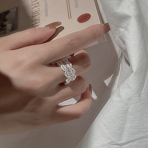 Elegant S925 sterling silver retro lace hollow ring worn in a vintage lifestyle setting
