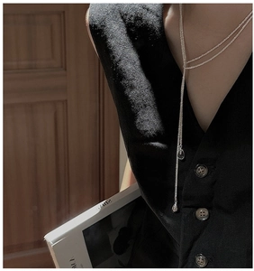 Detailed view of S925 silver Y-shaped long necklace featuring dual crystal water drop pendants