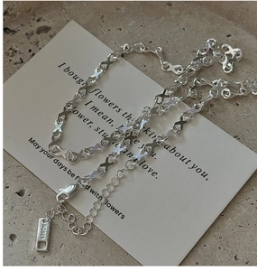 Detail view of S925 sterling silver infinity necklace with lobster clasp and AG925 hallmark