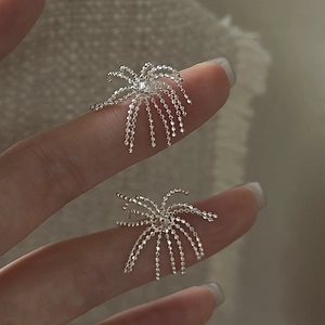Minimalist S925 sterling silver firework tassel earrings with radiant gemstone design