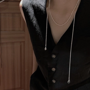 S925 sterling silver drop pendant long sweater chain with white crystal on a model