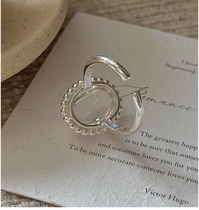 Macro detail of vintage S925 sterling silver open ring with decorative milgrain edge