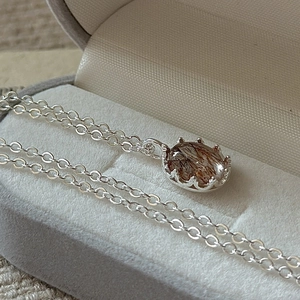 Elegant S925 sterling silver necklace with rutilated quartz pendant in a gift box