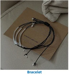 Three-layer black braided rope bracelets with silver tubes and teardrop pendants