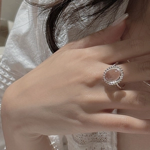 Elegant S925 sterling silver ring with oval pink crystal and beaded edge decoration