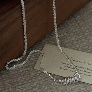 Minimalist S925 sterling silver chain necklace with retro interlocking rings on fabric