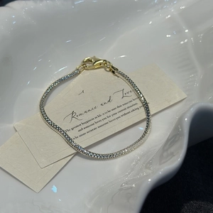 Elegant s925 silver flat snake chain bracelet with crystals and gold lobster clasp