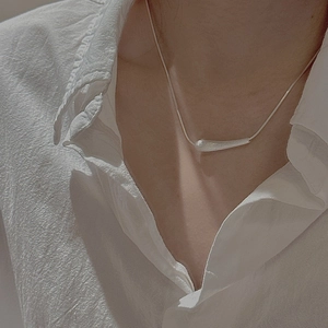 Minimalist S925 sterling silver brushed teardrop necklace with a sleek streamlined pendant