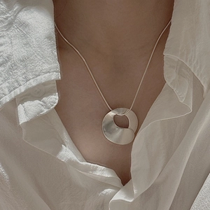 Minimalist S925 sterling silver snake chain necklace with fluid irregular circular pendant
