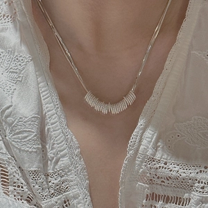 Minimalist S925 sterling silver double-layered twisted circle necklace on a model