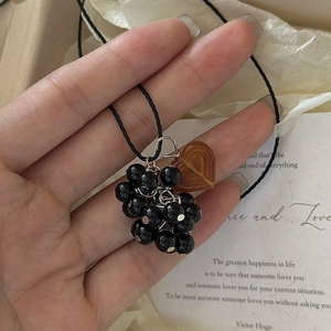 Handcrafted silver grape pendant necklace with black beads and amber heart charm