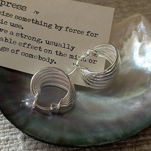 S925 sterling silver wave texture hoop earrings on iridescent shell tray, vintage style