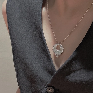 Minimalist S925 silver hollow round pendant necklace with radial pleated texture for women