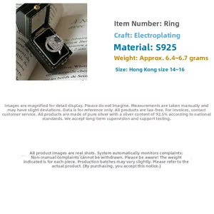 Detailed view of S925 silver ring with cushion cut crystal in a vintage jewelry box