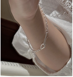Detailed view of S925 sterling silver chain bracelet with vintage OT buckle on wrist