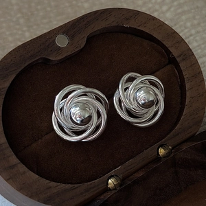 S925 sterling silver twist ball stud earrings in a luxury dark wood jewelry gift box