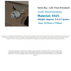 Macro shot of S925 sterling silver tree of life pendant with detailed vintage engraving