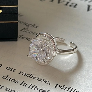Elegant S925 sterling silver ring with large square white crystal on vintage book