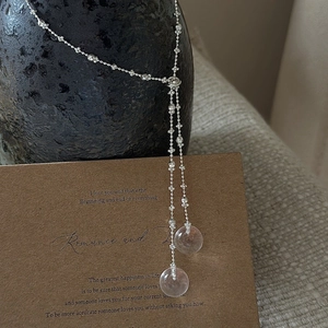 S925 silver retro necklace with purple crystals on vintage prop and brown card