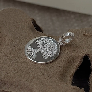 S925 sterling silver Tree of Life circular pendant with vintage embossed details on cork