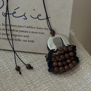 S925 sterling silver woven handbag pendant necklace with brown beads and matte finish