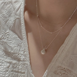 S925 sterling silver double-layered necklace with frosted bead pendant on model