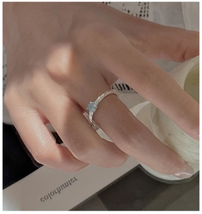 Close-up of S925 sterling silver aquamarine ring with unique hammered texture