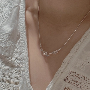 Minimalist S925 sterling silver knot necklace with sleek snake chain for women
