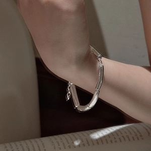 Minimalist S925 sterling silver bangle with tube segments and adjustable link chain