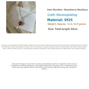 Detail view of S925 sterling silver strawberry pendant necklace with beaded chain
