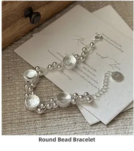 Close-up of S925 sterling silver beaded bracelet with S925 stamp tag and lobster clasp