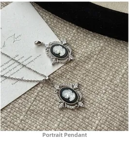 Macro detail of vintage cameo portrait pendant with zircon accents on silver chain